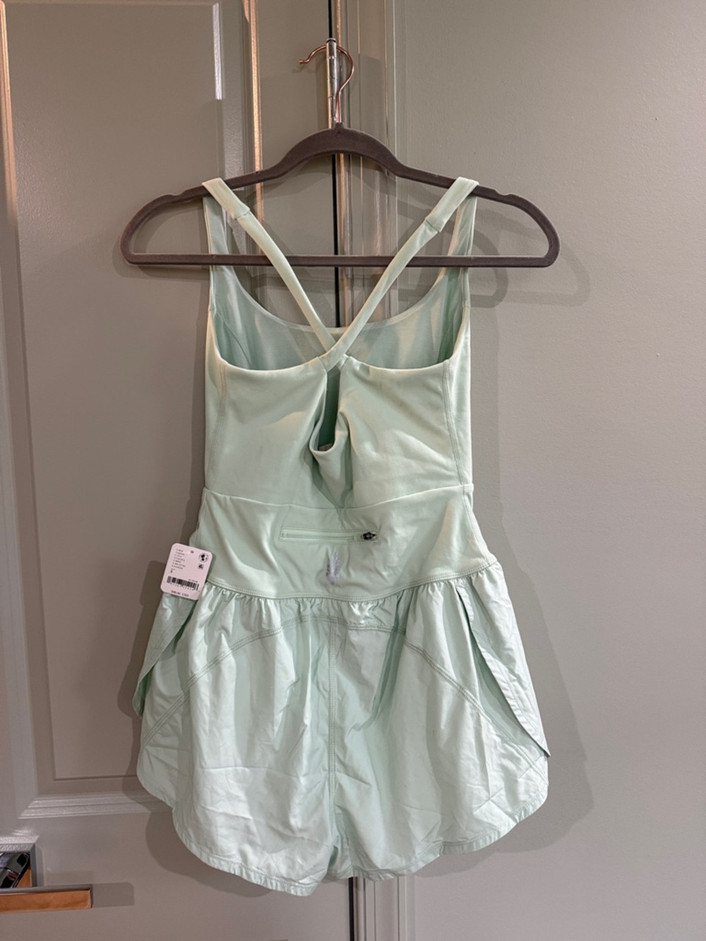 NEVER WORN. Free People Movement Mint Green Sleeveless Romper with Cutout - Picture 2 of 4